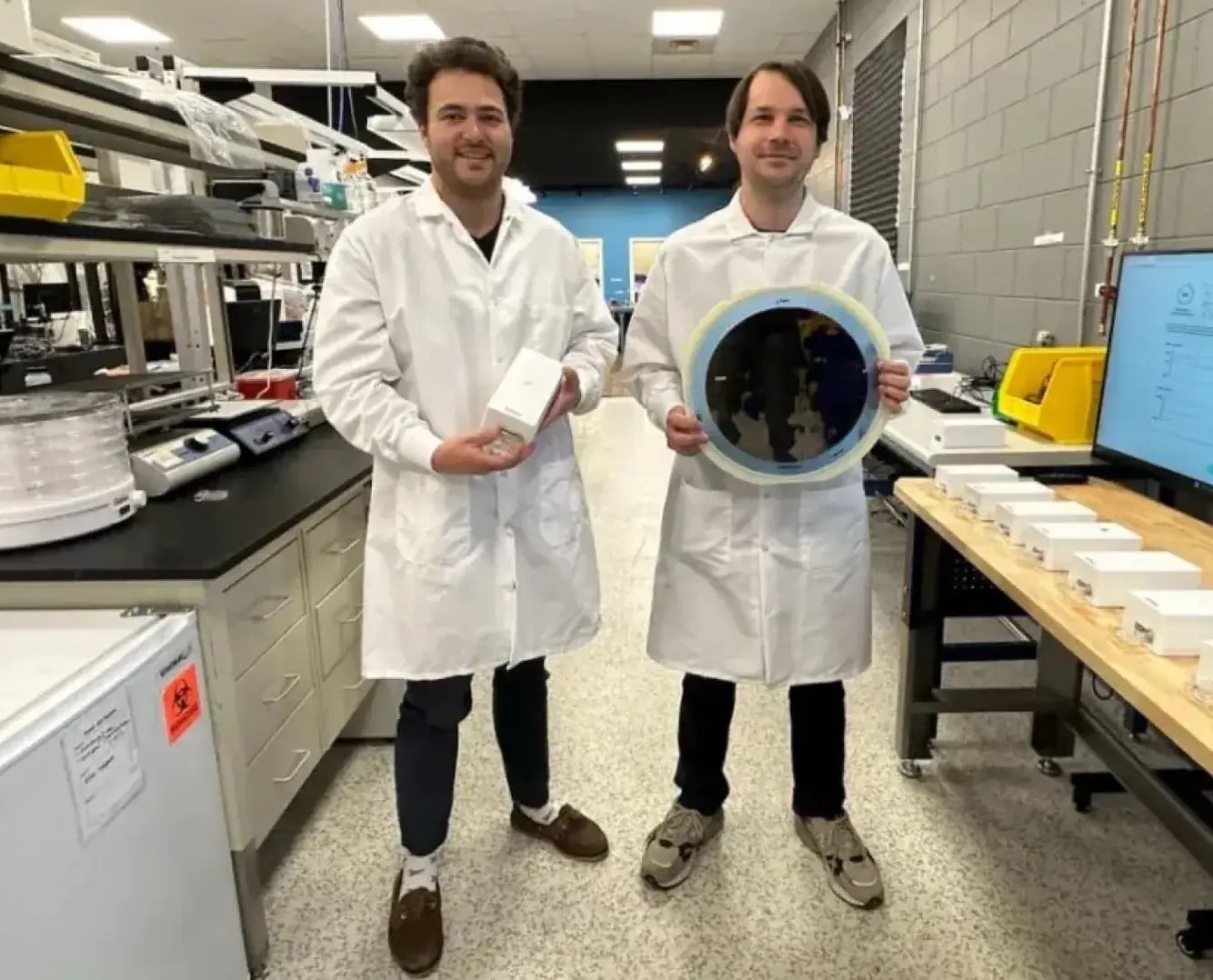 Co-founders in a lab