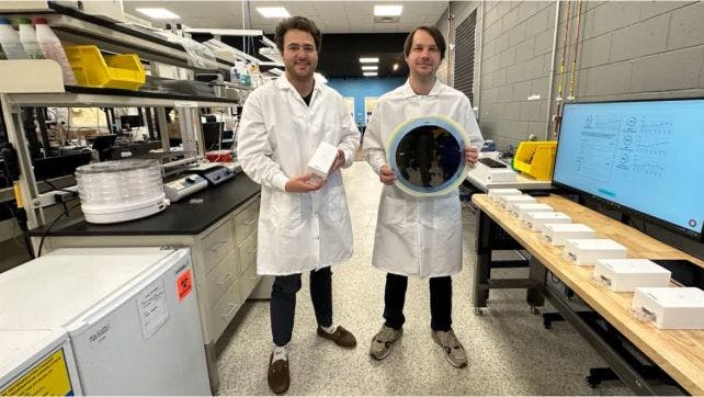 Co-founders in a lab